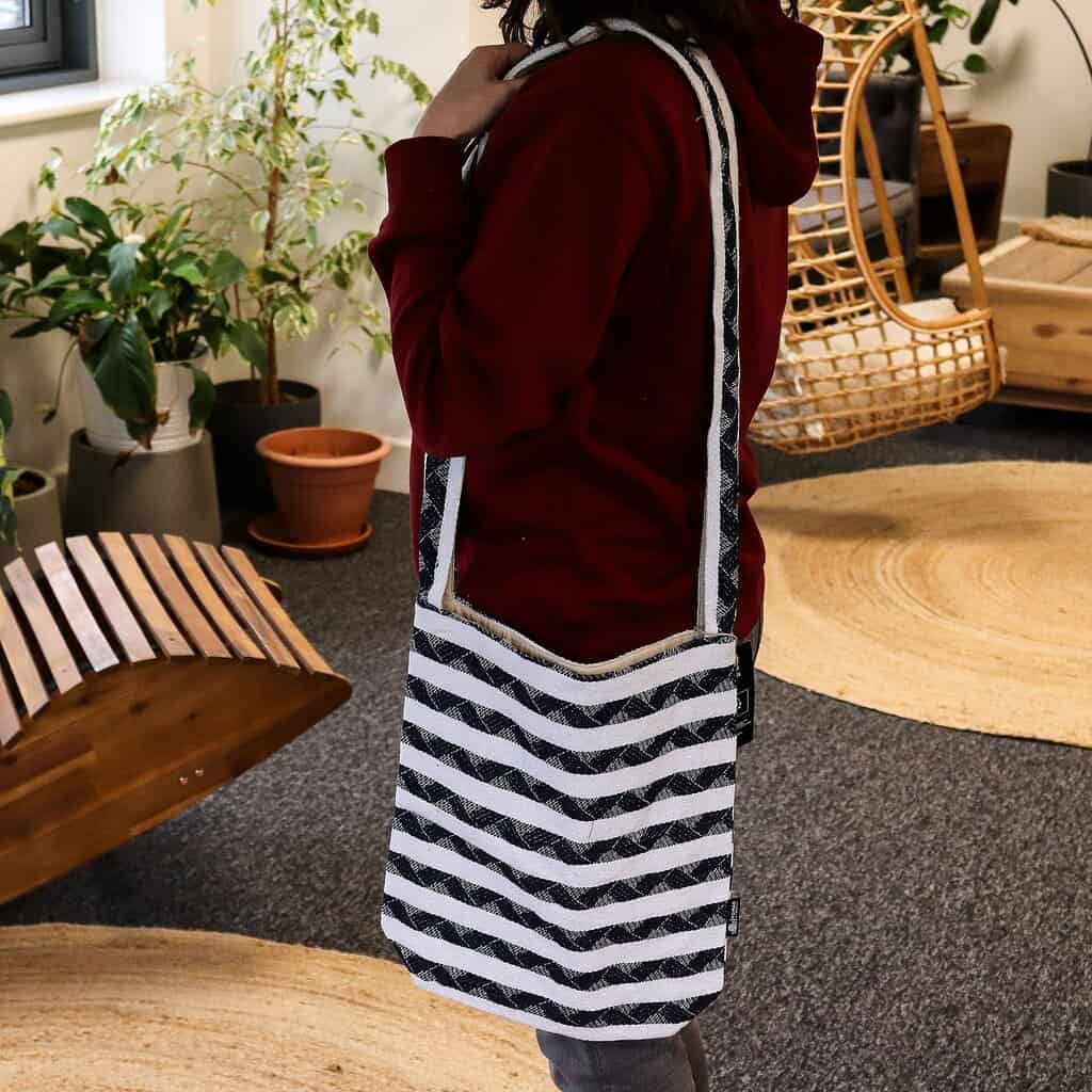 Reusable shopping bag, black and white striped design, eco-friendly foldable tote for groceries and daily use, Maverick Bags style, sustainable fashion accessory.