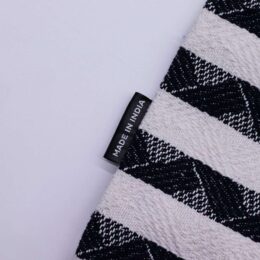 Soft black and white checkered towels made in India for premium quality.